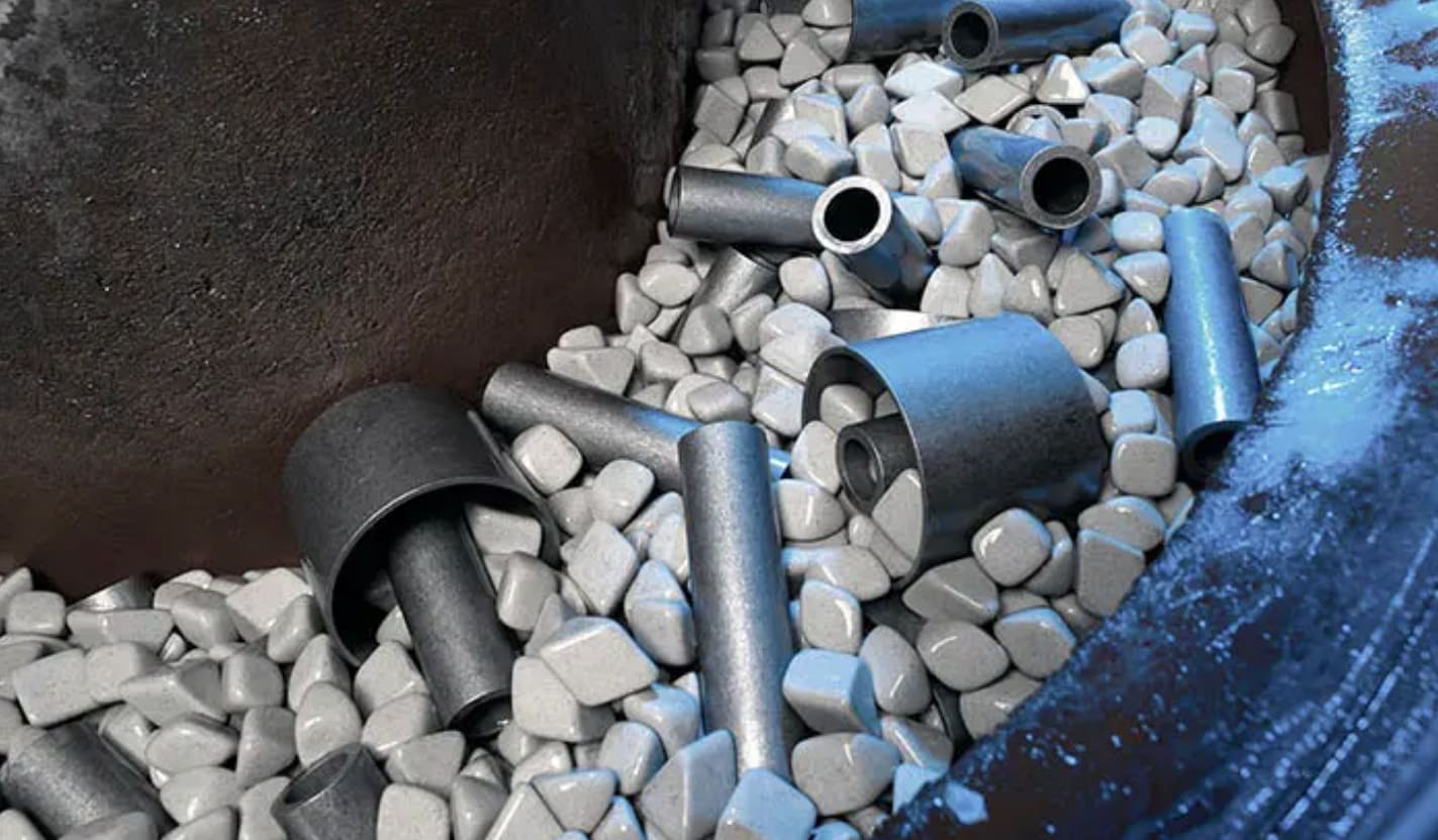 Trommeln von Metallteilen – Kredit von INOVATEC Tumbling Metal Parts-Credit from INOVATEC